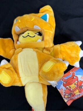 Pokémon Pikachu plush dressed in charizard outfit